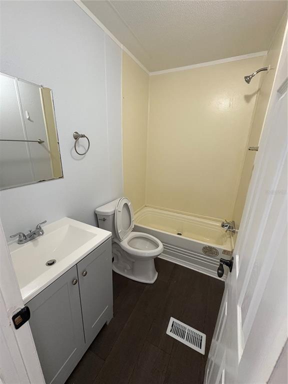 8939 Beverly Hills Road Lakeland, FL 33809 - Photo 14 of 23 a bathroom with a sink and a mirror