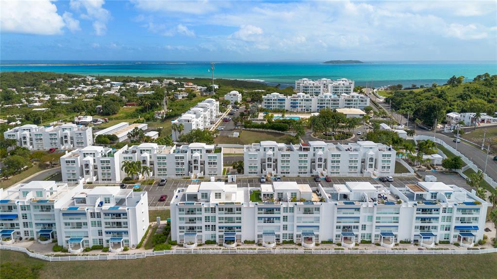 401 The Ocean Club, Unit PW401 Fajardo, PR 00738 - Photo 1 of 1 a view of a city with tall buildings
