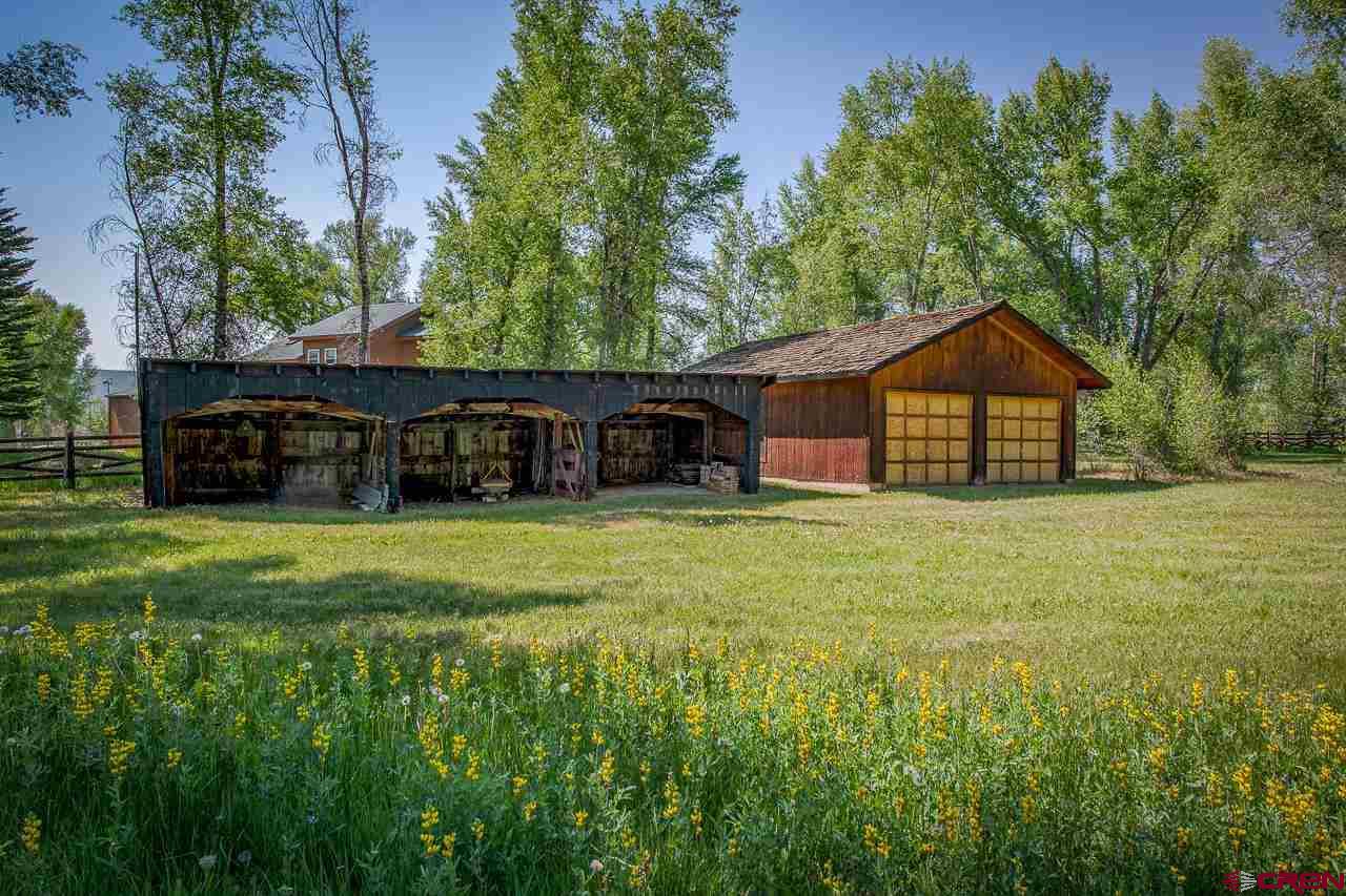 171 Arapahoe Road Gunnison, CO 81230 - Photo 27 of 34 3 stall shed and second detached two car garage.