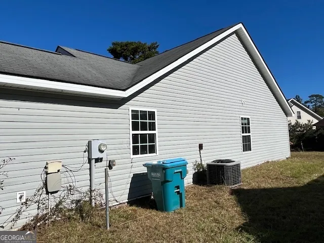 a view of a back yard of the house