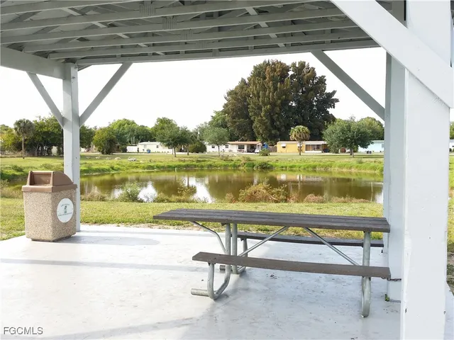a view of swimming pool with a yard