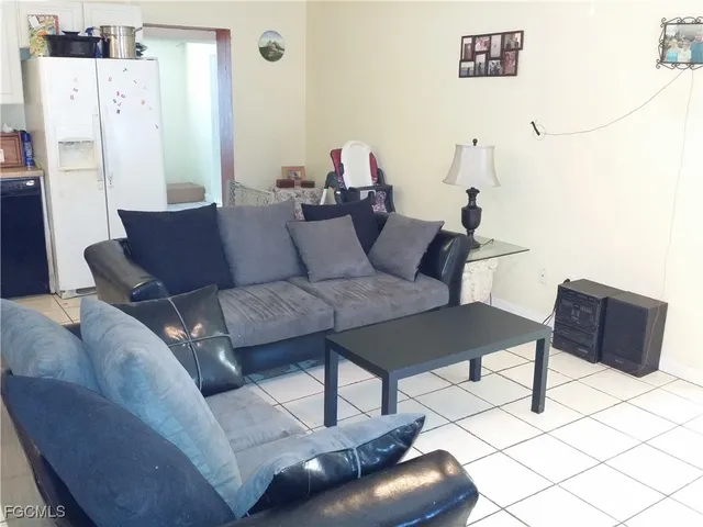 a living room with furniture and a couch