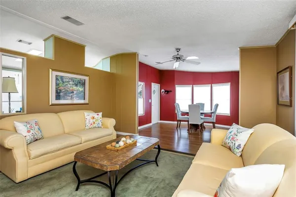 a living room with furniture and a couch