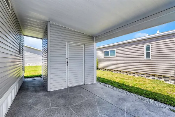 a view of a swimming pool with a sitting space