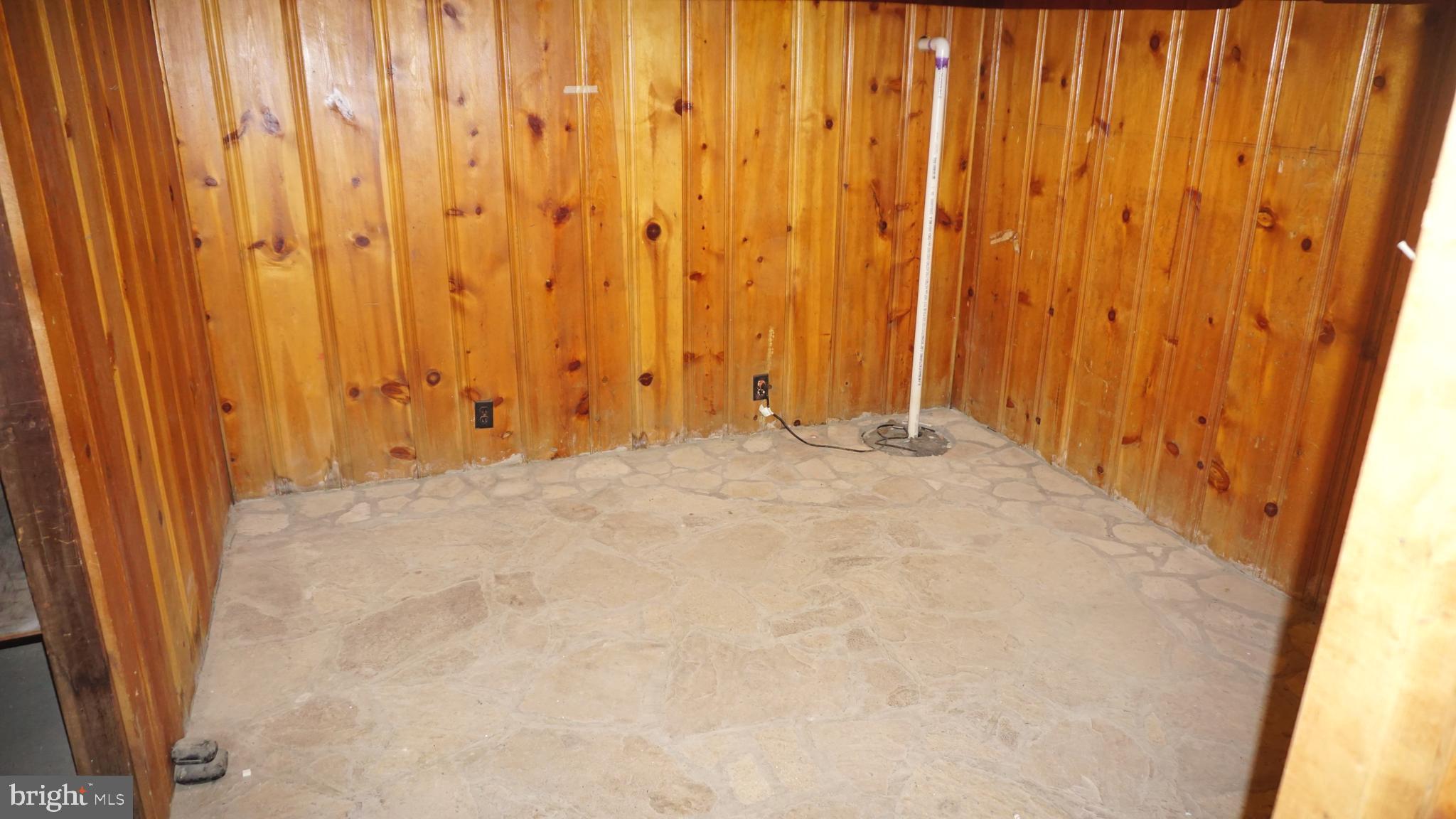8237 Highpoint Road Clearwater Beach, MD 21226 - Photo 40 of 50 Basement Rm #3 featuring slate floors/knotty pine