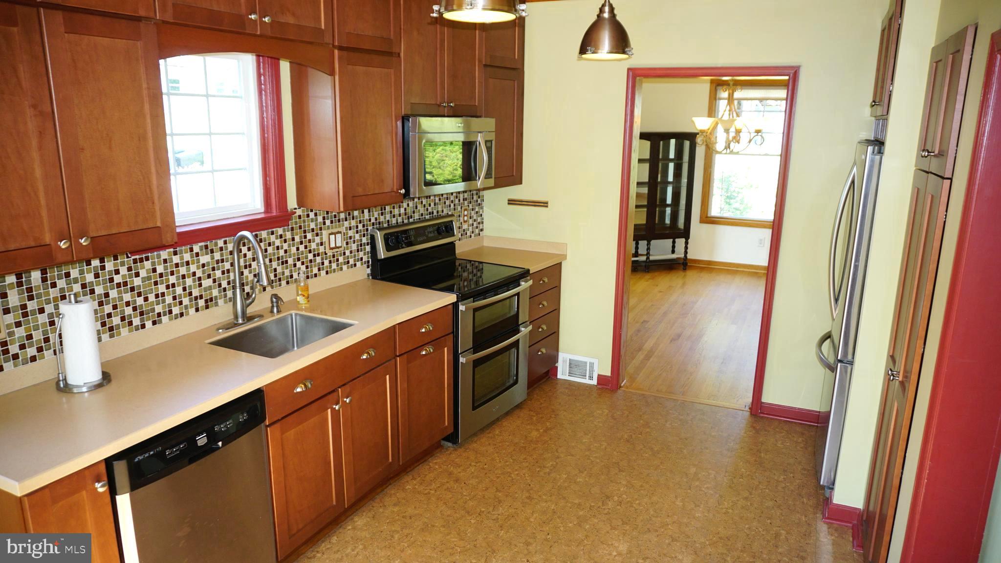 8237 Highpoint Road Clearwater Beach, MD 21226 - Photo 8 of 50 Gourmet Kitchen/ featuring Lg Pantry w/pull outs