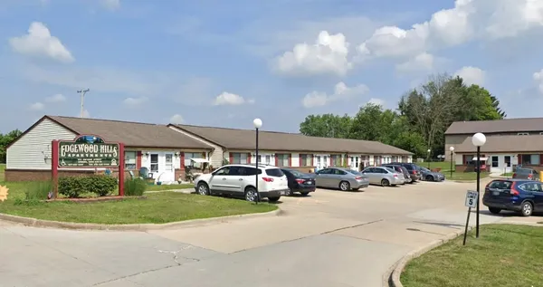 a cars parked in front of a building