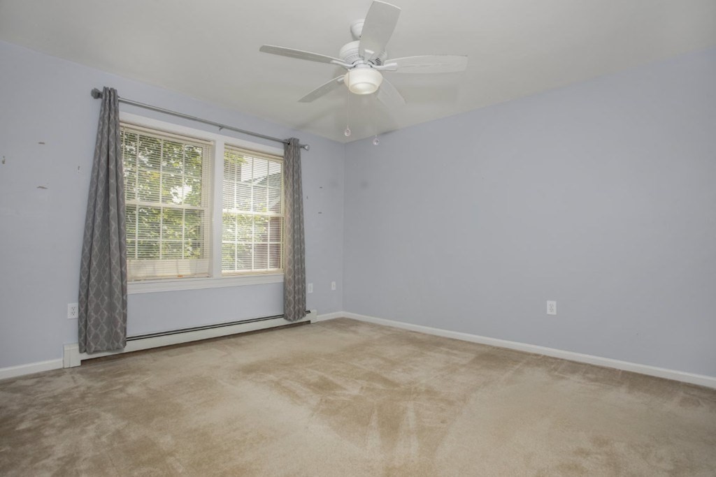 3 Bancroft Avenue, Unit 3 Reading, MA 01867 - Photo 11 of 19 a view of an empty room with a window