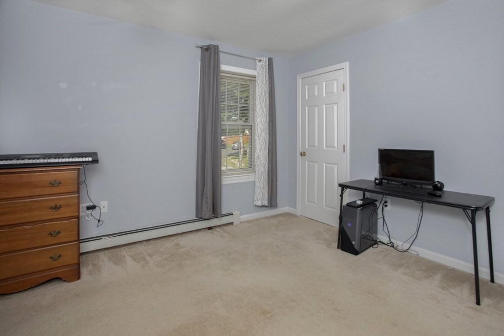 3 Bancroft Avenue, Unit 3 Reading, MA 01867 - Photo 14 of 19 a view of work space with furniture and windows