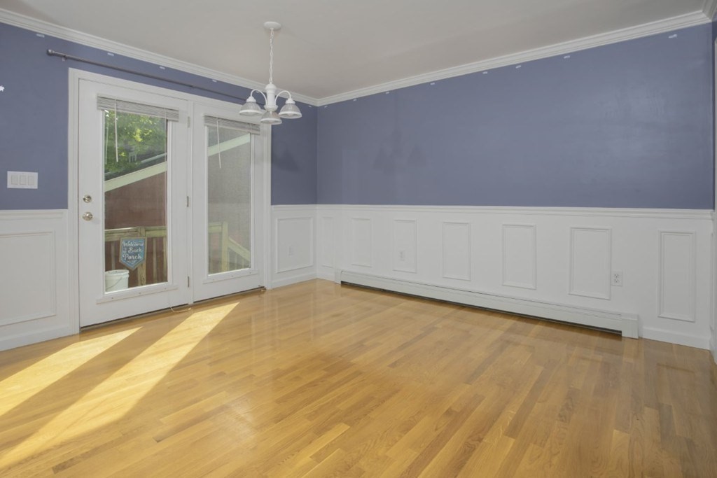 3 Bancroft Avenue, Unit 3 Reading, MA 01867 - Photo 5 of 19 a view of an empty room with a window