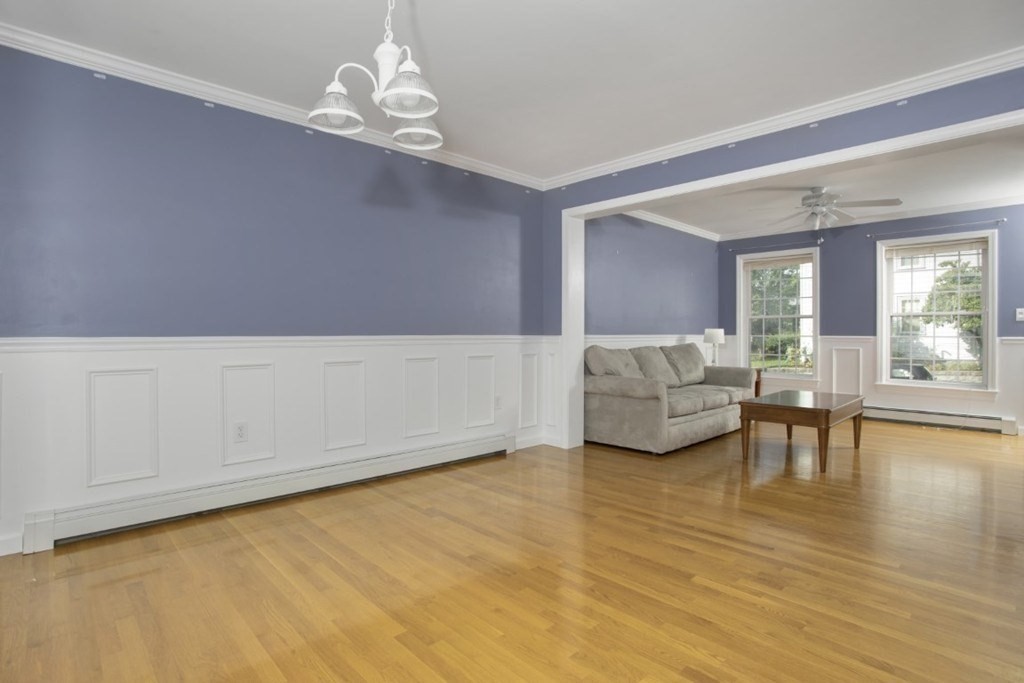 3 Bancroft Avenue, Unit 3 Reading, MA 01867 - Photo 6 of 19 a living room with furniture and a table