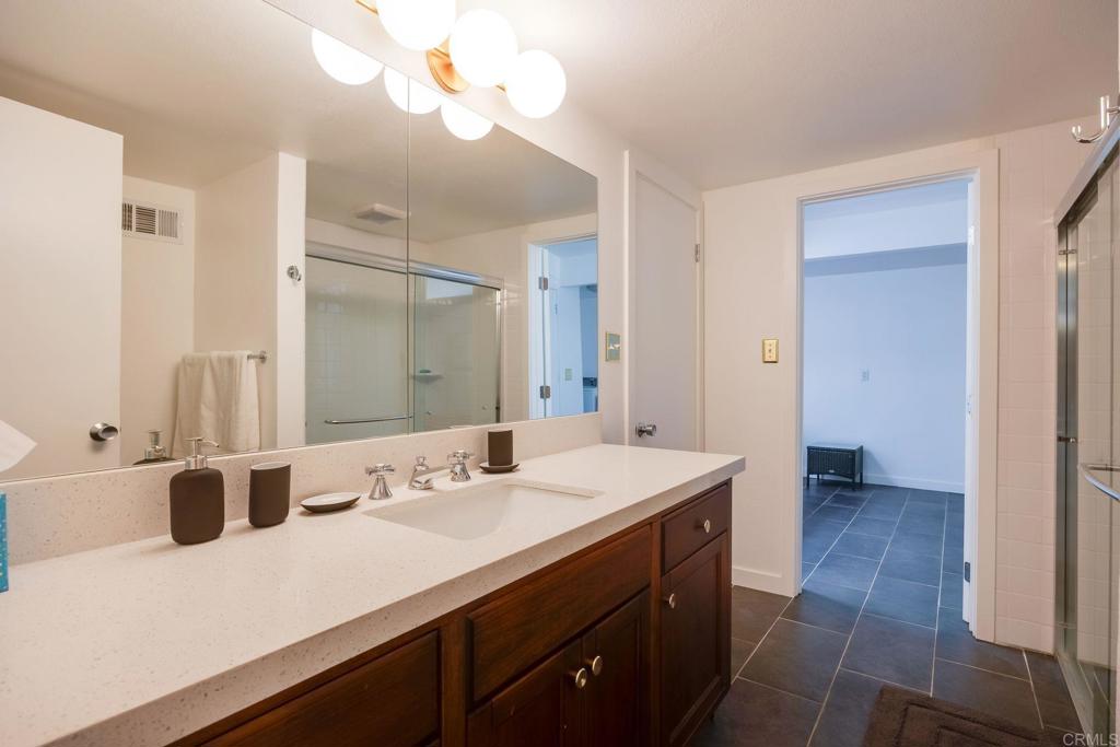 255 Montezuma Road Borrego Springs, CA 92004 - Photo 19 of 26 a bathroom with a sink a vanity and a mirror