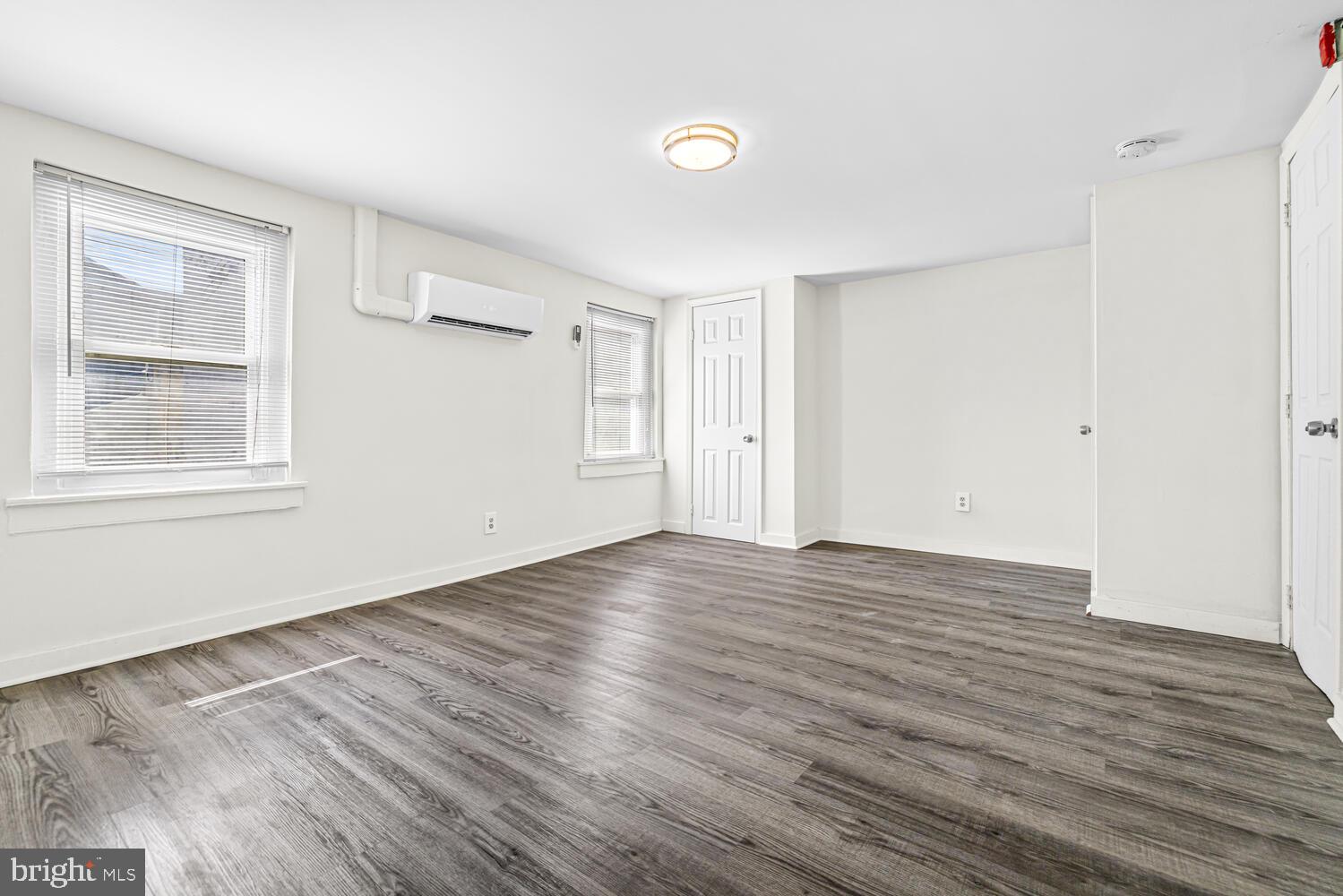 178 Master Street Philadelphia, PA 19122 - Photo 13 of 19 a view of empty room with wooden floor and fan