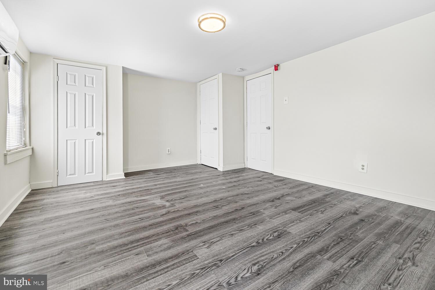 178 Master Street Philadelphia, PA 19122 - Photo 14 of 19 wooden floor in an empty room