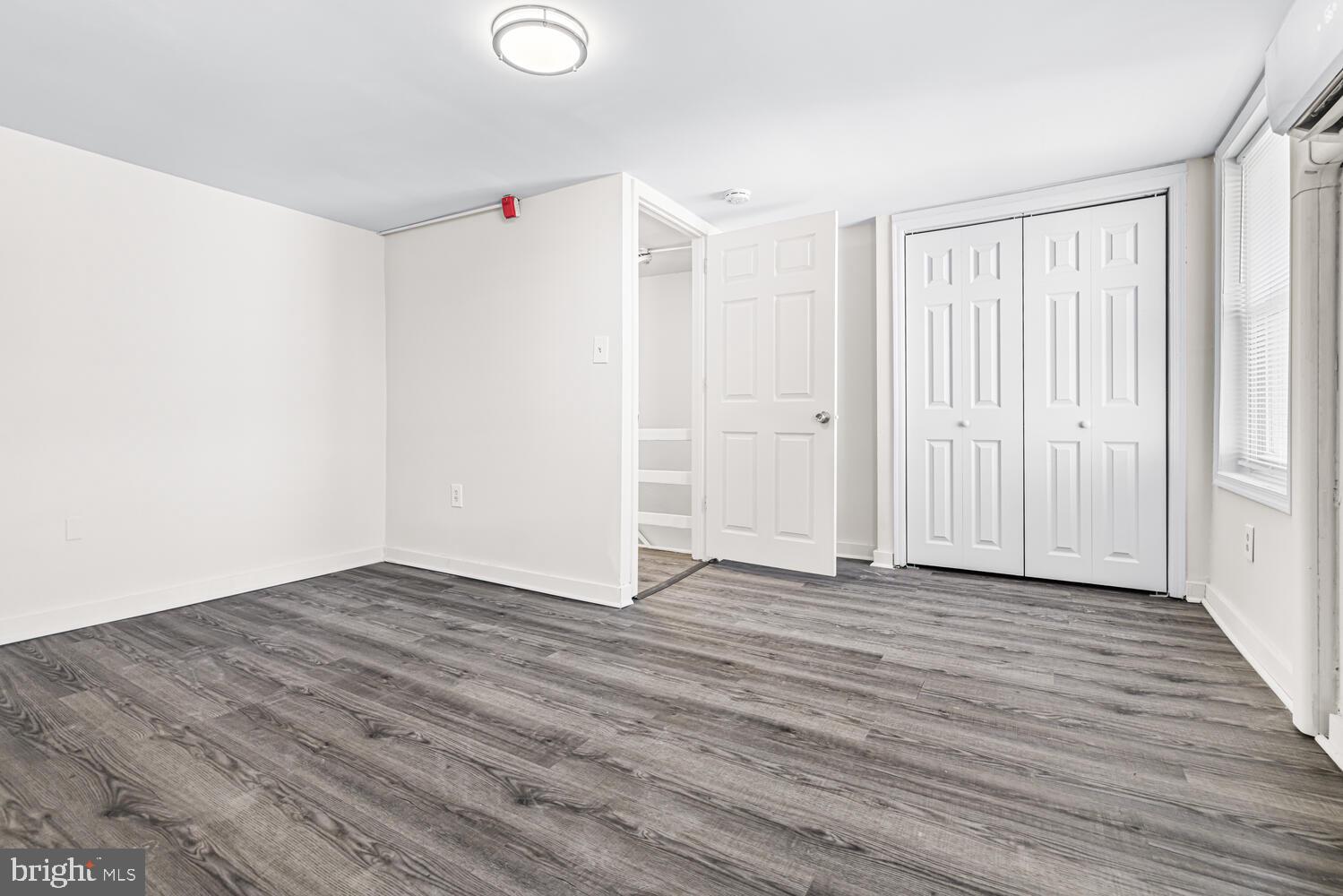 178 Master Street Philadelphia, PA 19122 - Photo 15 of 19 a view of an empty room with wooden floor