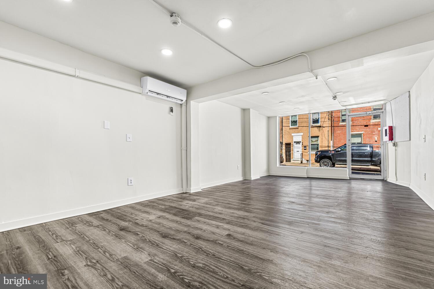 178 Master Street Philadelphia, PA 19122 - Photo 3 of 19 a view of a livingroom with wooden floor