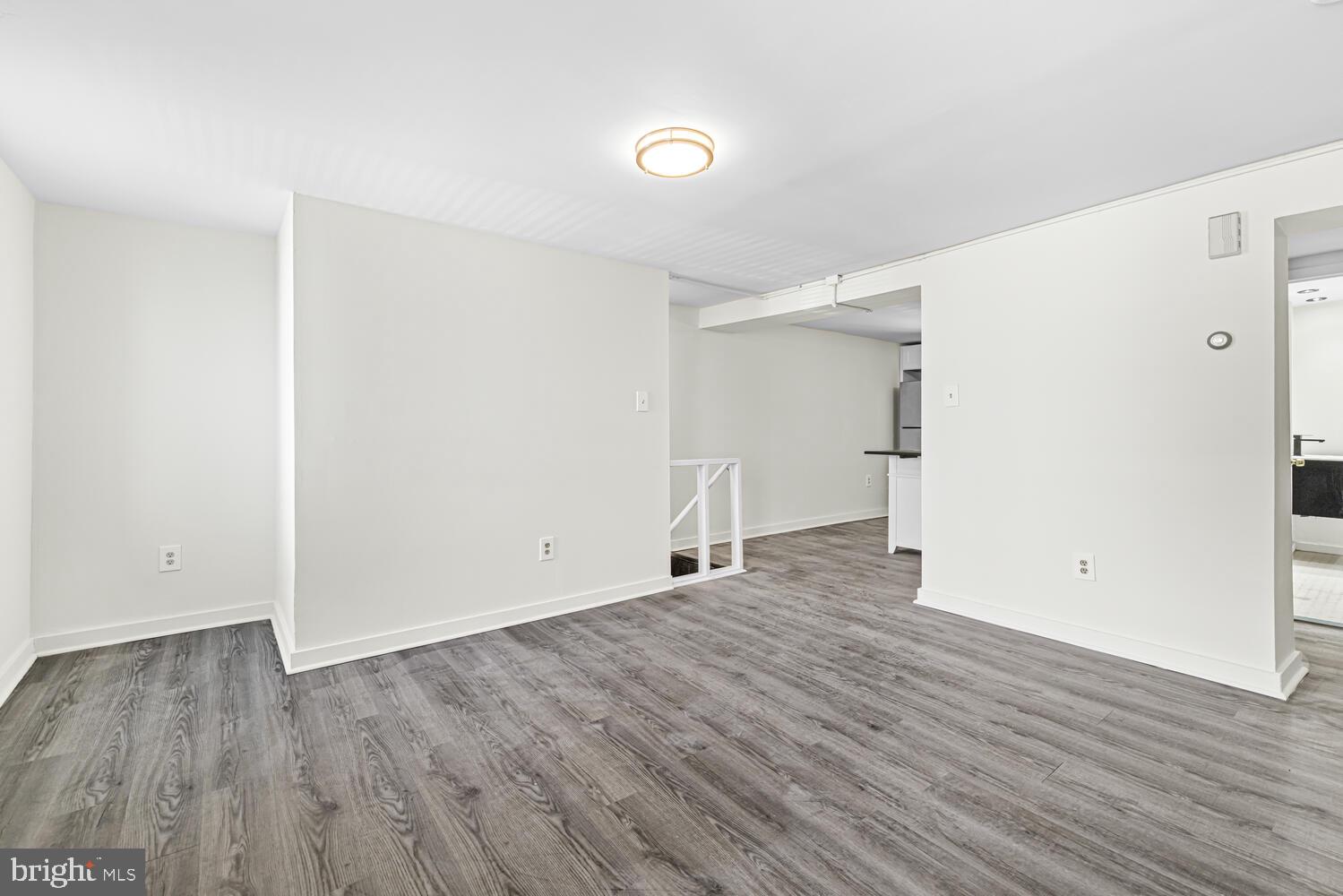 178 Master Street Philadelphia, PA 19122 - Photo 9 of 19 a view of empty room with wooden floor