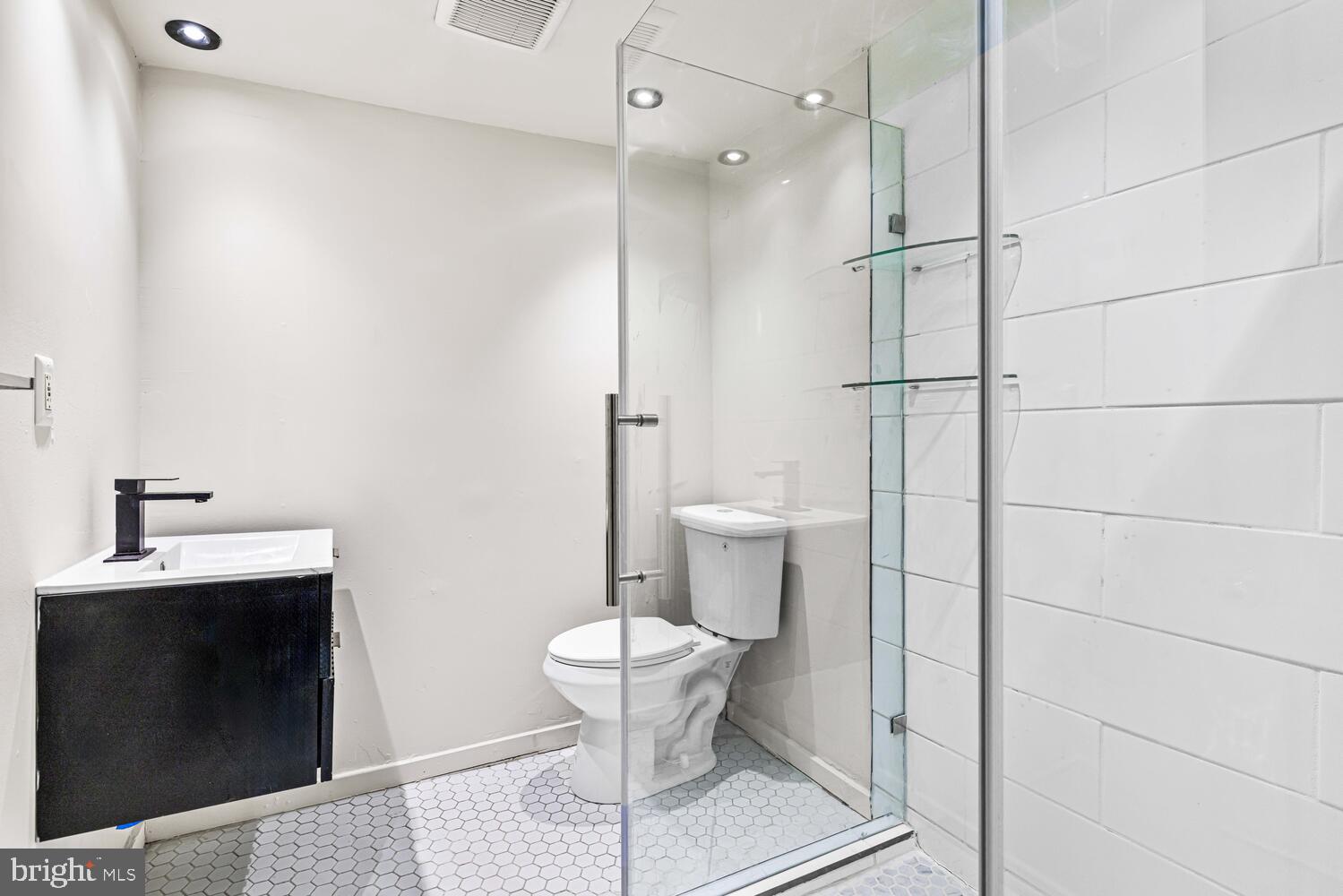 178 Master Street Philadelphia, PA 19122 - Photo 10 of 19 a bathroom with a sink toilet and shower