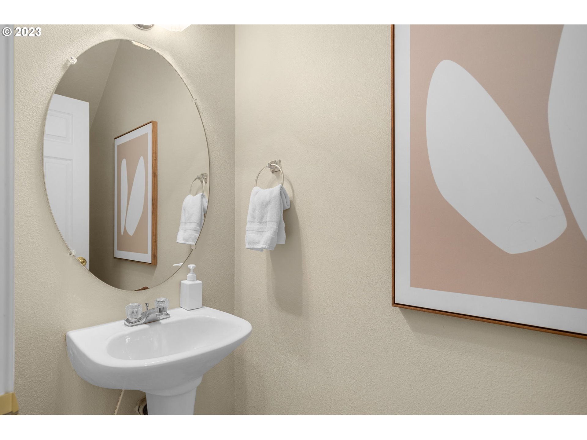 17697 Southwest September Lane Beaverton, OR 97003 - Photo 14 of 24 a bathroom with a sink and a mirror