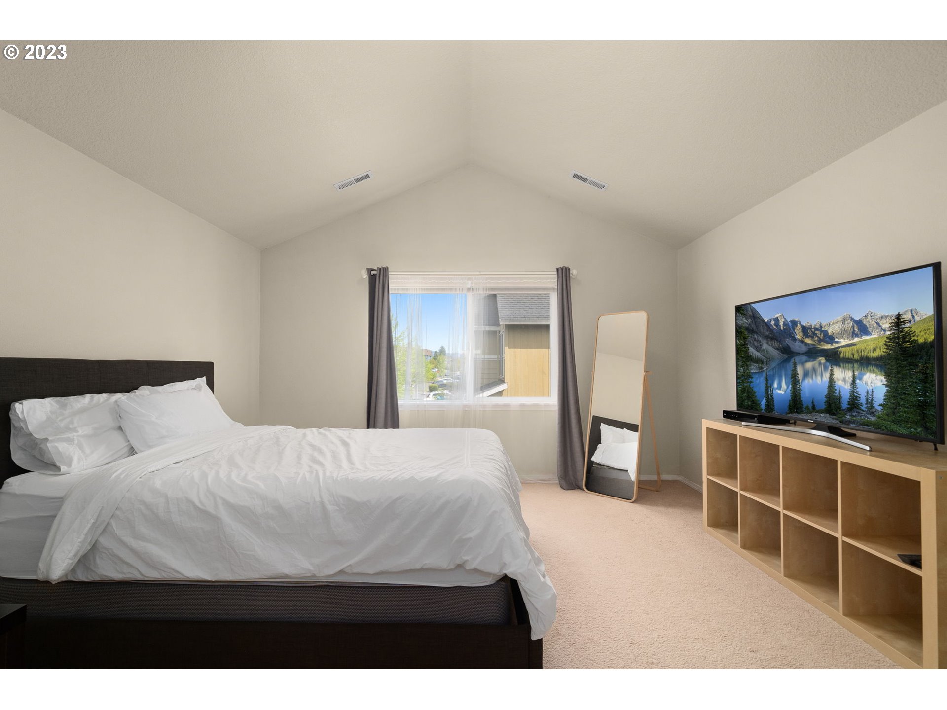 17697 Southwest September Lane Beaverton, OR 97003 - Photo 15 of 24 a bedroom with a bed and a view of kitchen