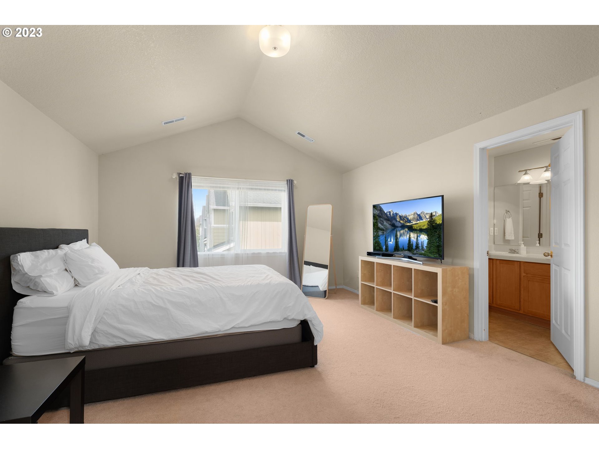 17697 Southwest September Lane Beaverton, OR 97003 - Photo 16 of 24 a bedroom with a bed and a television