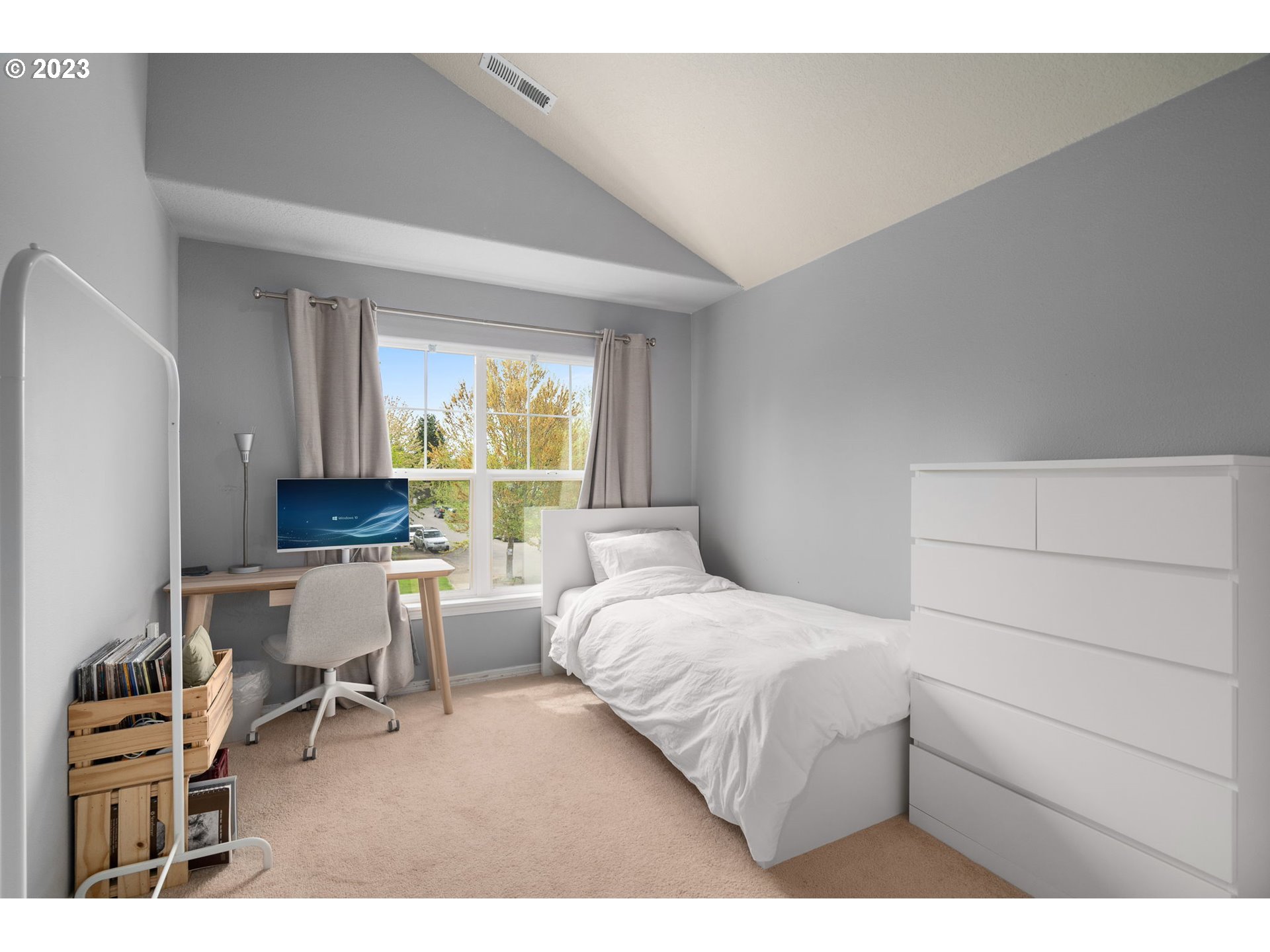 17697 Southwest September Lane Beaverton, OR 97003 - Photo 22 of 24 a bedroom with a bed and a chair