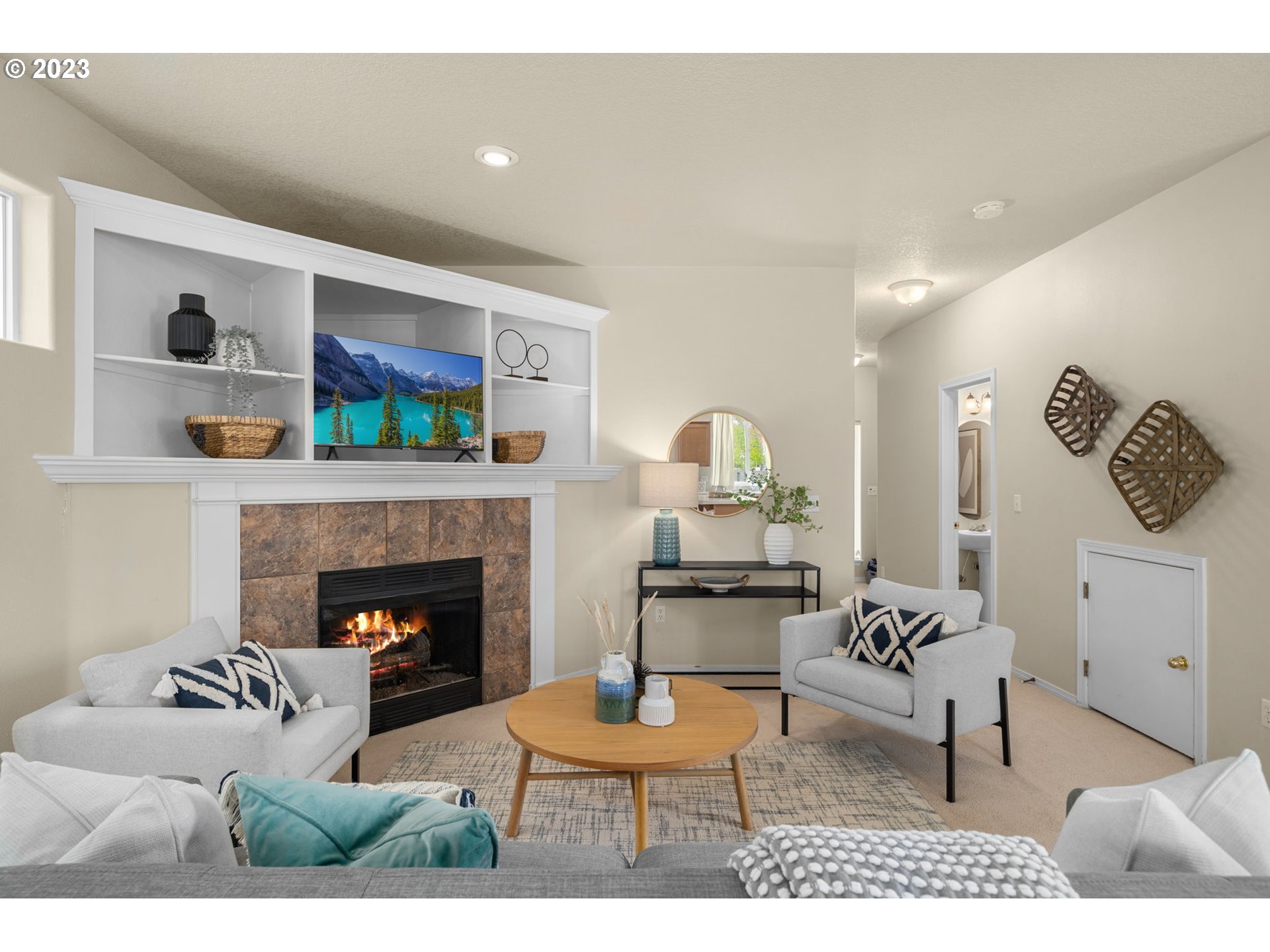 17697 Southwest September Lane Beaverton, OR 97003 - Photo 6 of 24 a living room with furniture and a fireplace