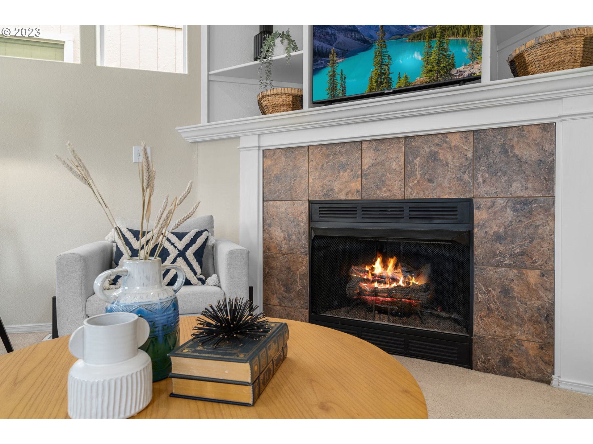 17697 Southwest September Lane Beaverton, OR 97003 - Photo 7 of 24 a living room with furniture and a fireplace