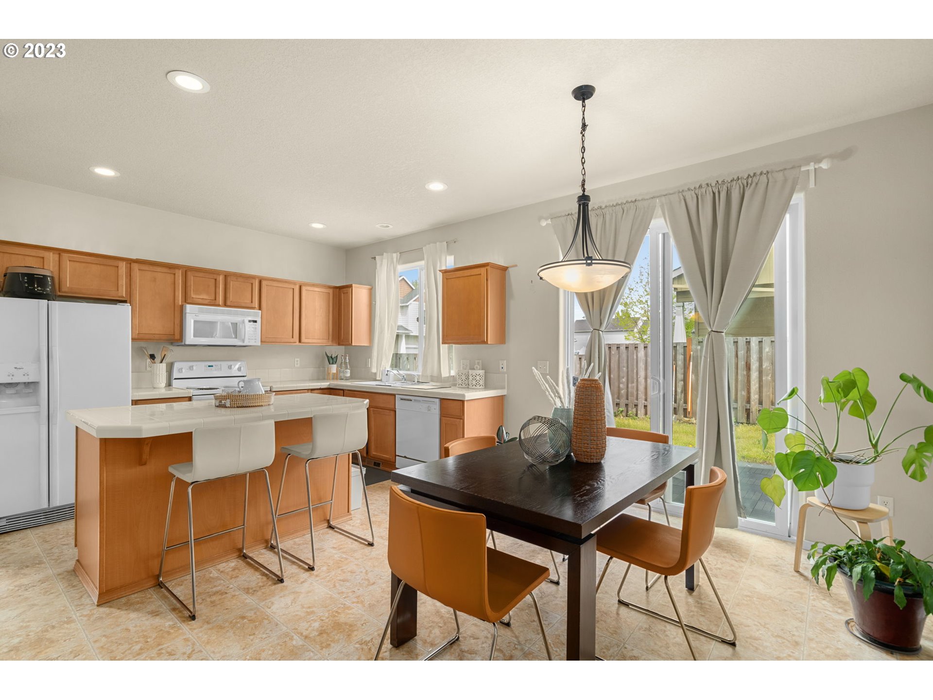 17697 Southwest September Lane Beaverton, OR 97003 - Photo 8 of 24 a dining room with furniture and window