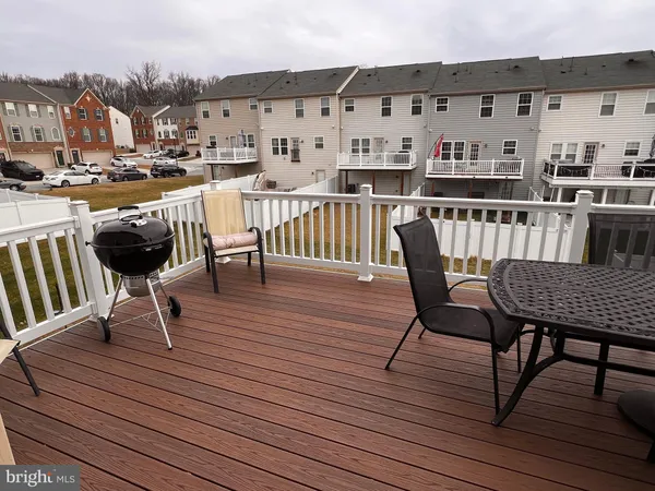 a view of a terrace with seating area