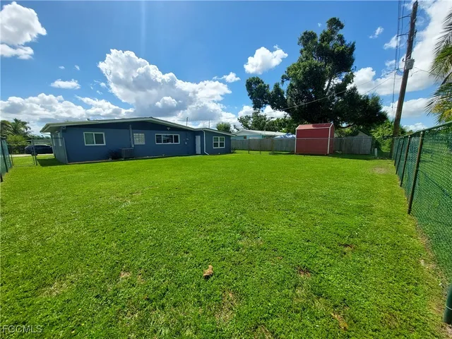 a view of a backyard with plants