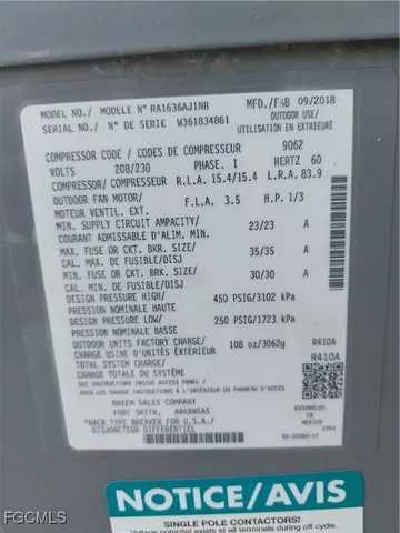 a kitchen with stainless steel appliances granite countertop a refrigerator