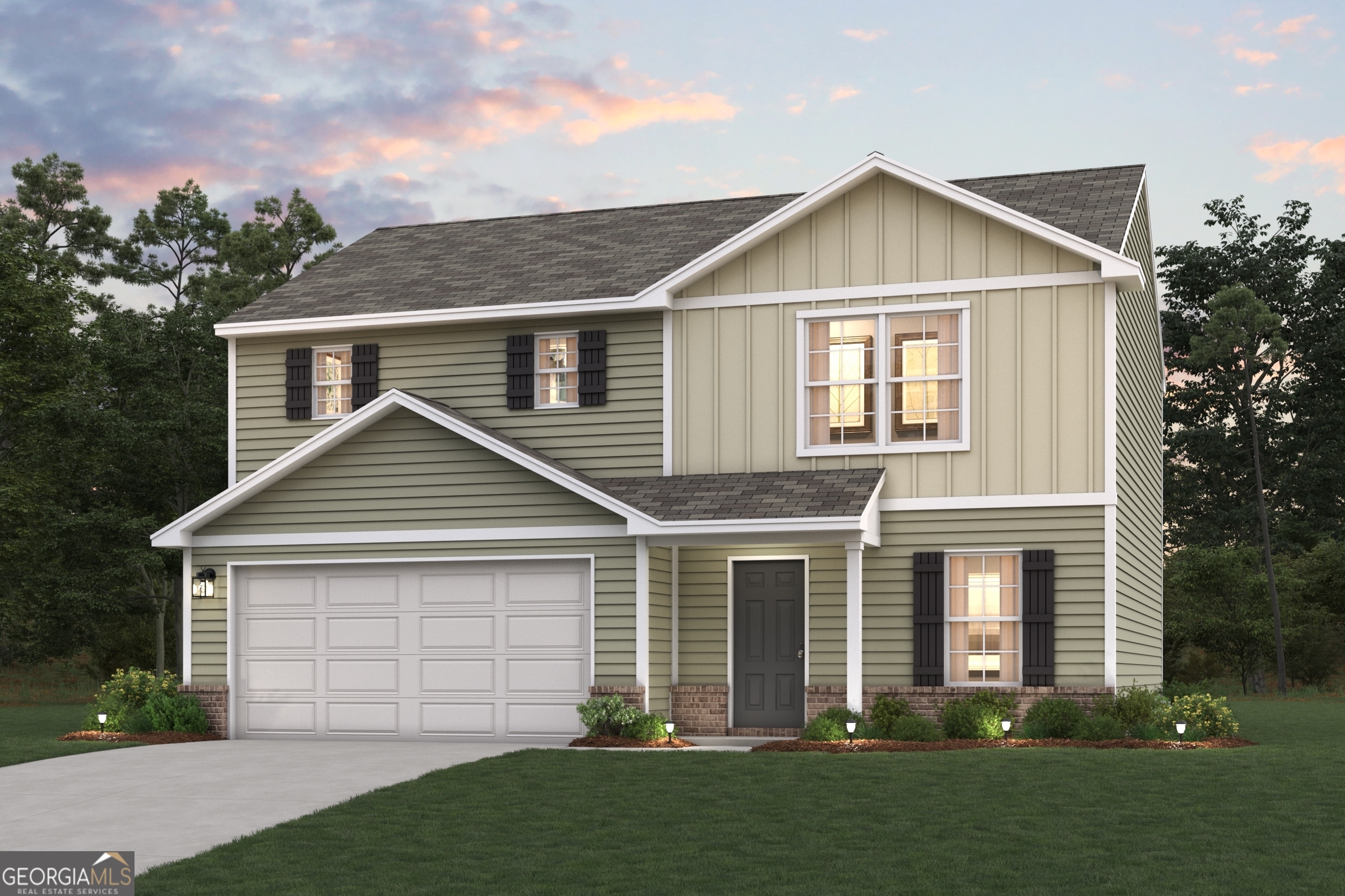 a front view of a house with a yard and garage