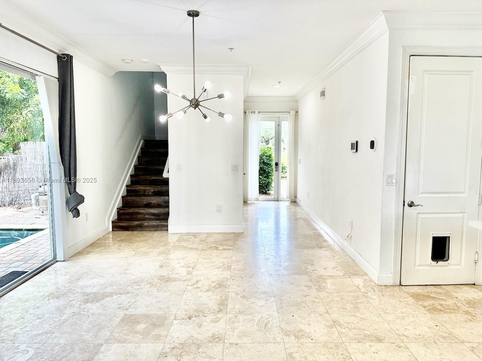 813 Southeast 18th Court Fort Lauderdale, FL 33316 - Photo 11 of 43 a view of a hallway with wooden floor and entryway