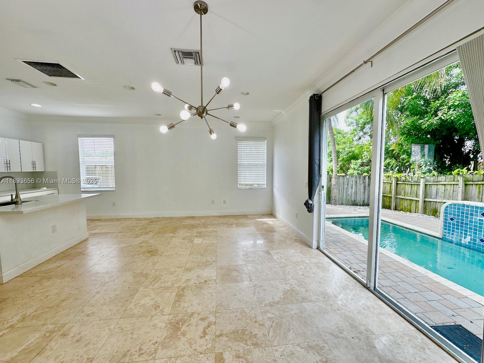 813 Southeast 18th Court Fort Lauderdale, FL 33316 - Photo 18 of 43 a view of an empty room and window