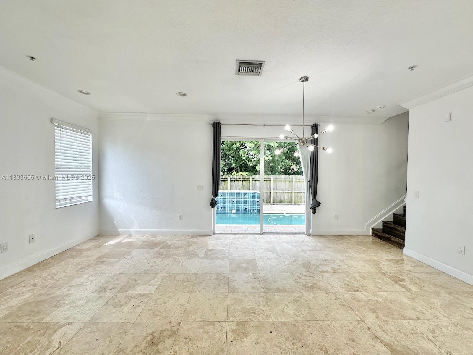 813 Southeast 18th Court Fort Lauderdale, FL 33316 - Photo 19 of 43 a view of an empty room with a window