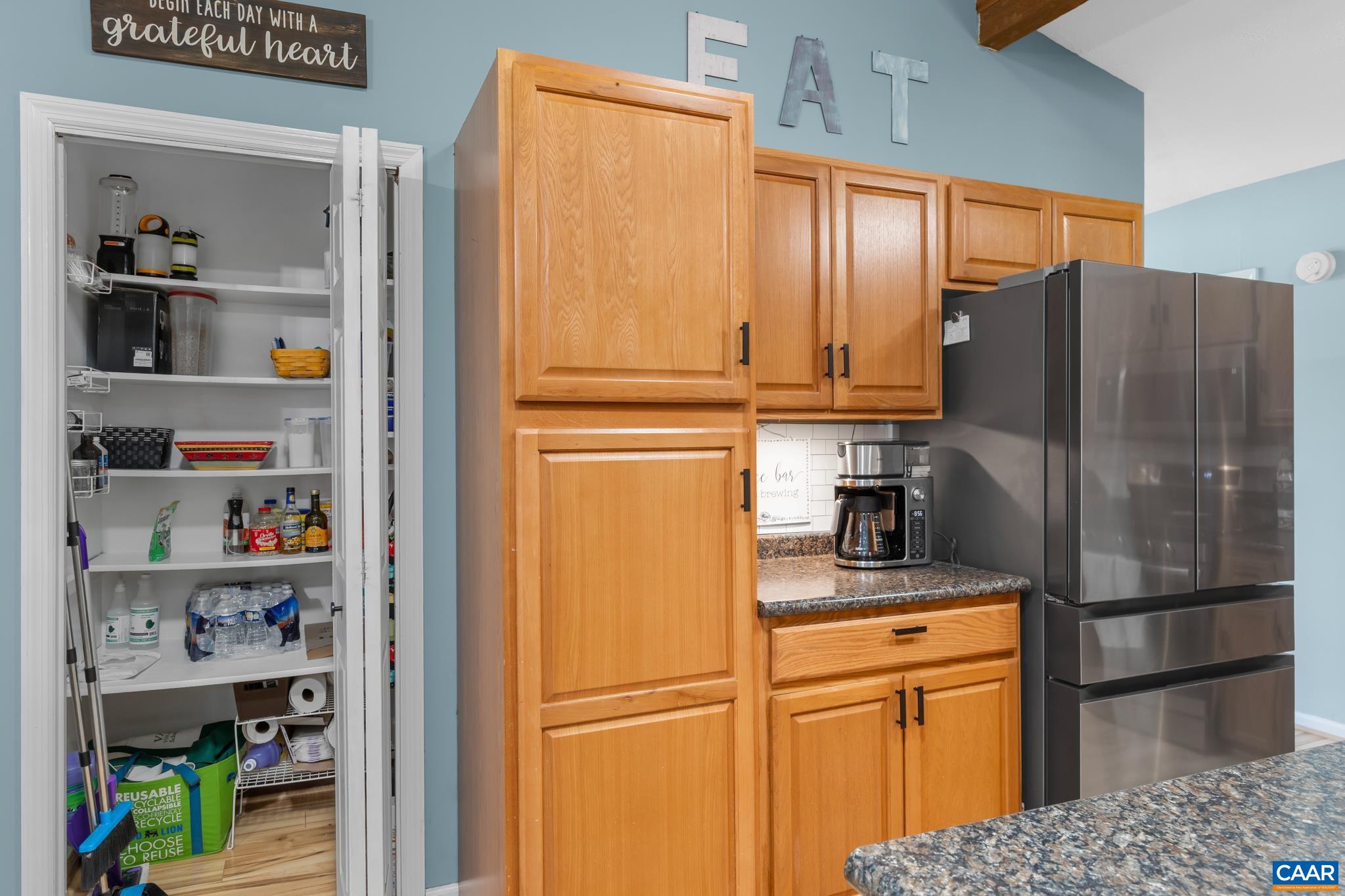 1971 Wilderness Road Reva, VA 22735 - Photo 13 of 47 a kitchen with stainless steel appliances granite countertop a refrigerator and a cabinets