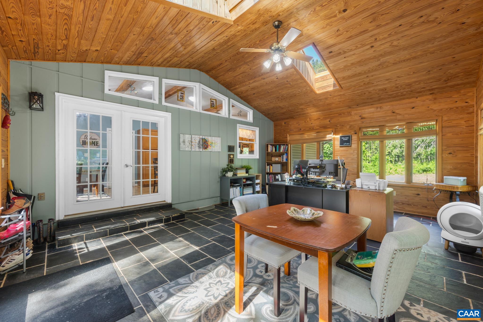 1971 Wilderness Road Reva, VA 22735 - Photo 16 of 47 a view of a dining room with furniture window and outside view