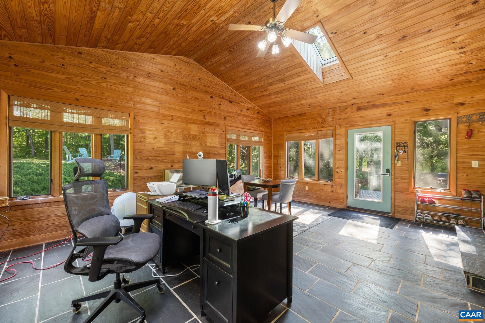 1971 Wilderness Road Reva, VA 22735 - Photo 17 of 47 a living room with furniture and large windows