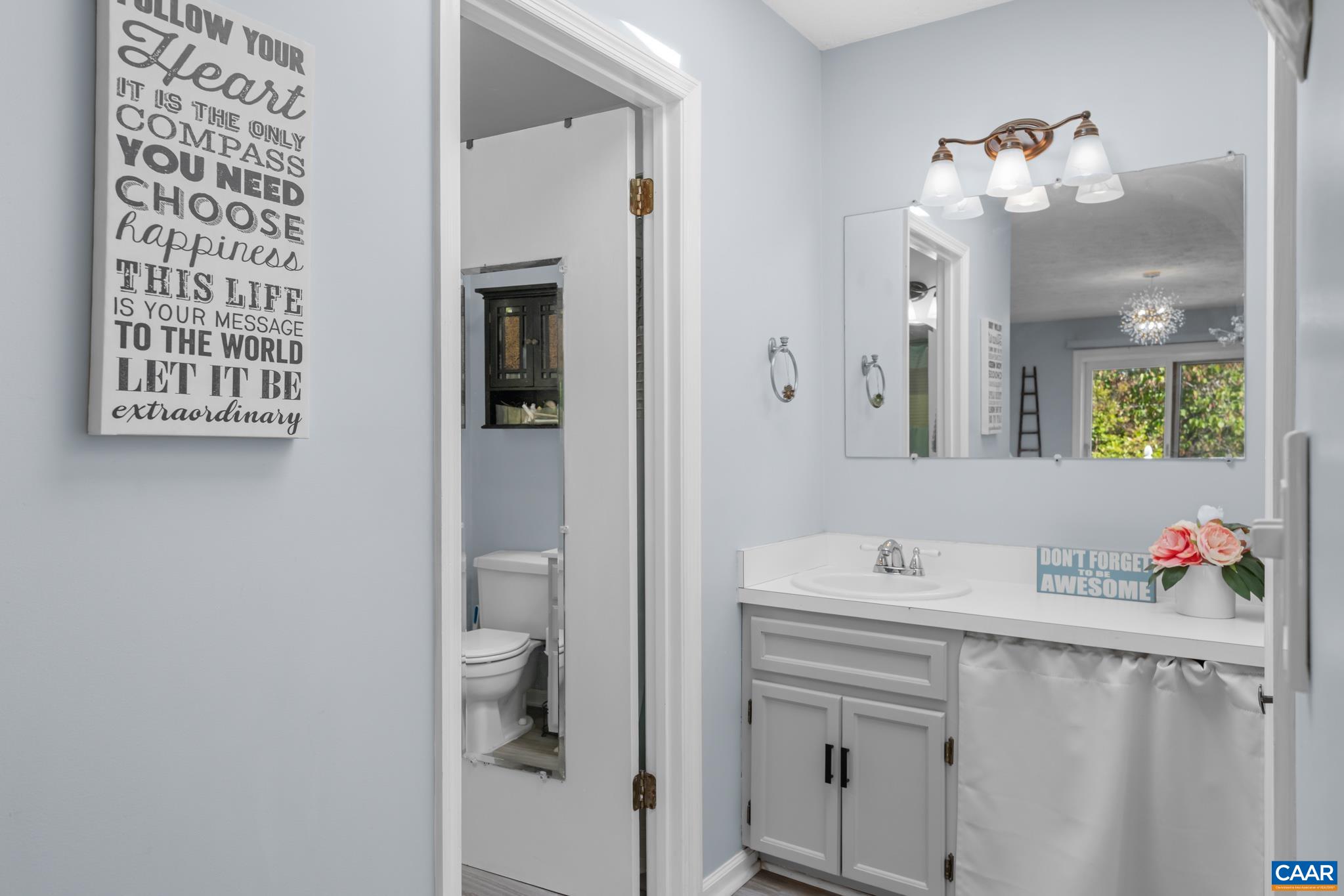 1971 Wilderness Road Reva, VA 22735 - Photo 23 of 47 a bathroom with a sink vanity and a mirror