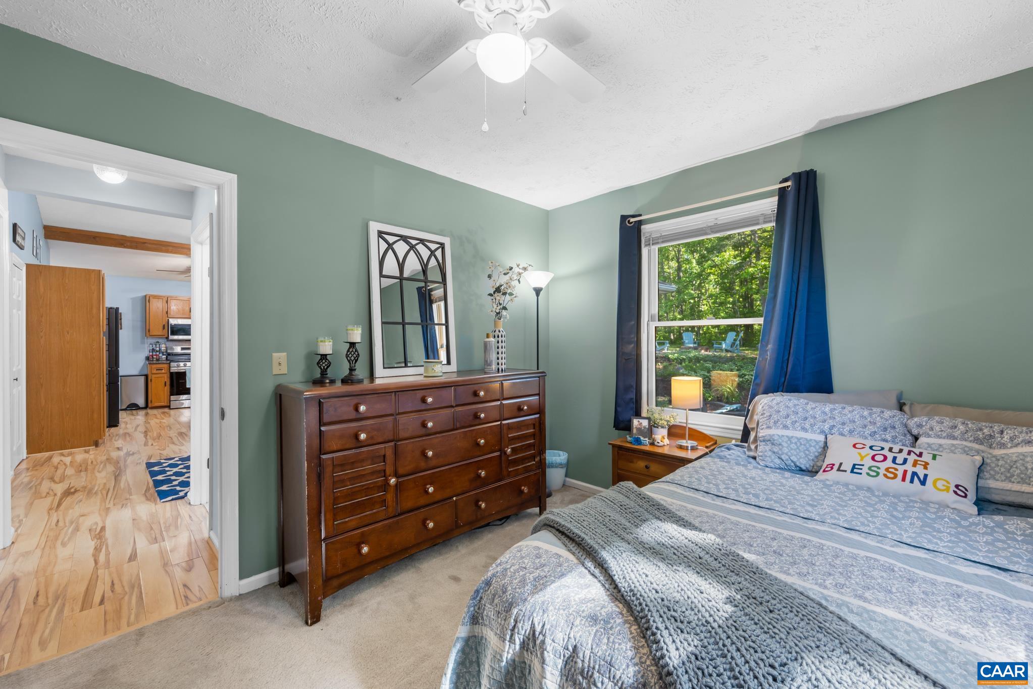 1971 Wilderness Road Reva, VA 22735 - Photo 26 of 47 a bedroom with a bed and a mirror on dresser