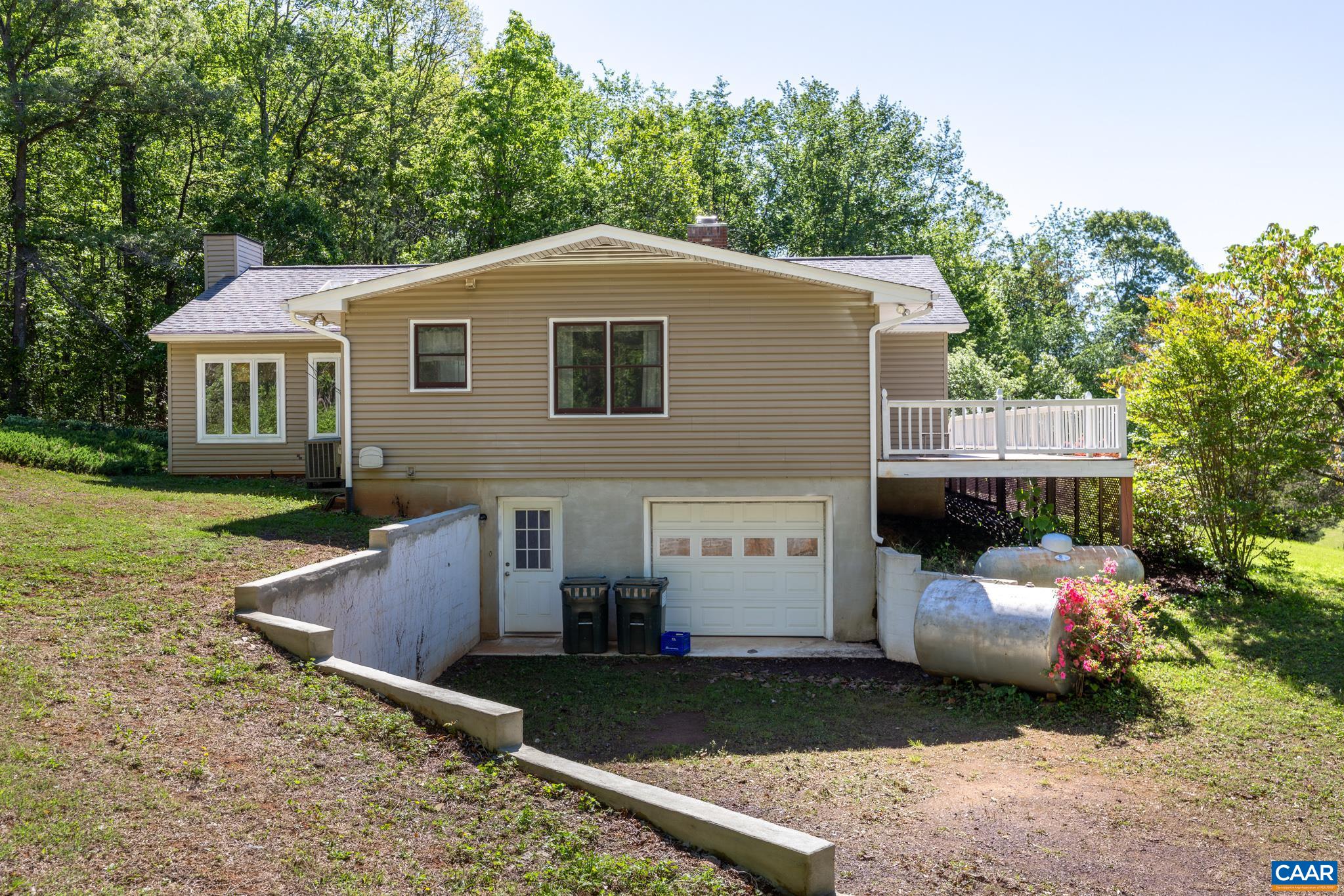 1971 Wilderness Road Reva, VA 22735 - Photo 3 of 47 a front view of a house with garden