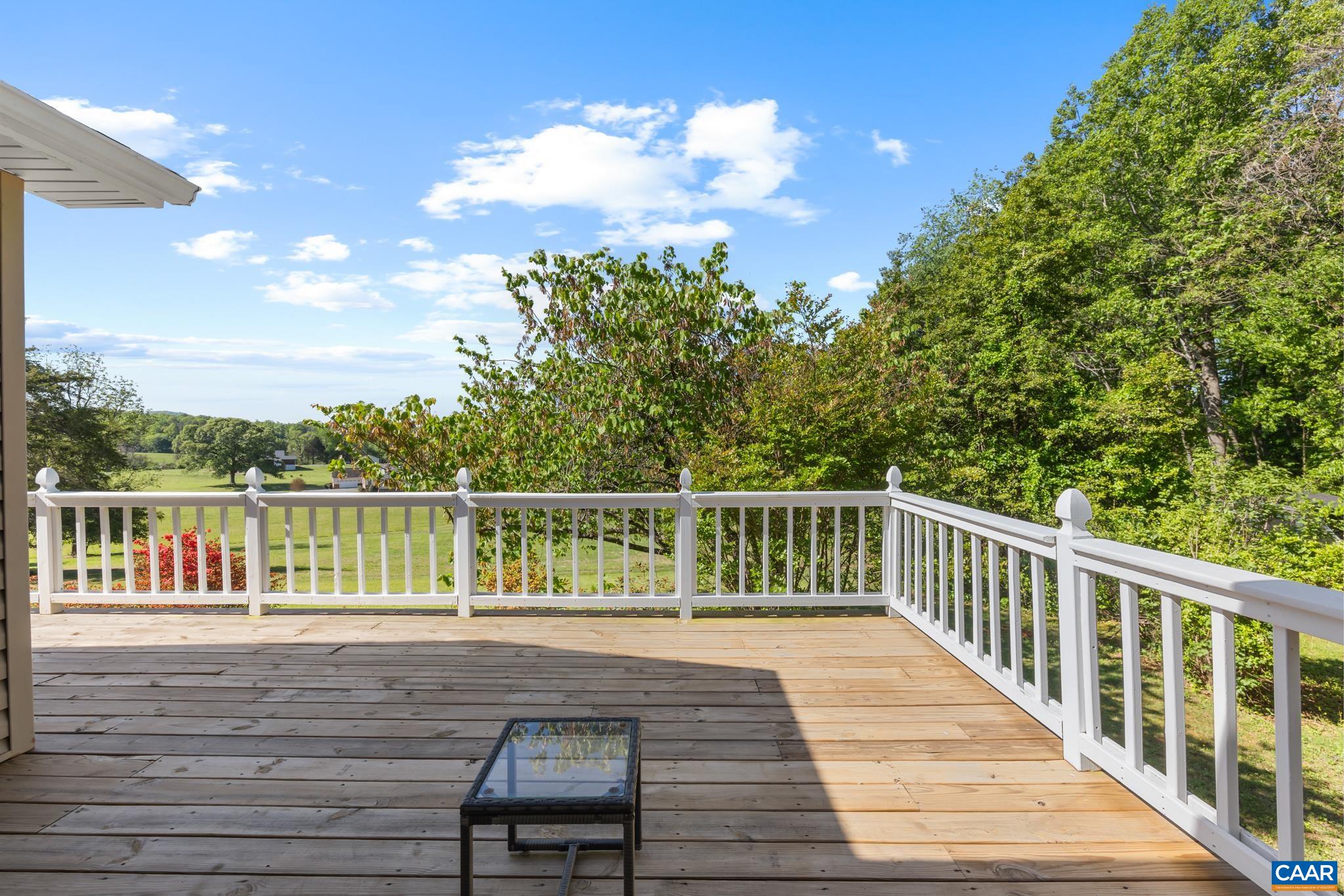 1971 Wilderness Road Reva, VA 22735 - Photo 35 of 47 a view of balcony with wooden floor and fence