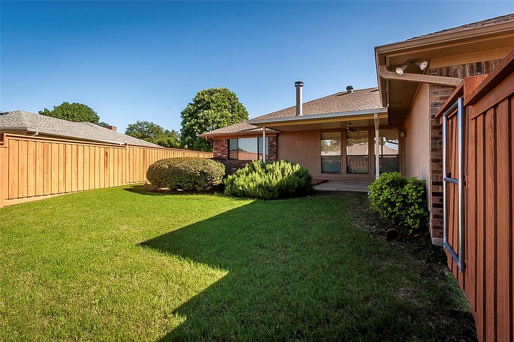 1004 Ledgemont Drive Plano, TX 75025 - Photo 27 of 29 a view of a house with a garden