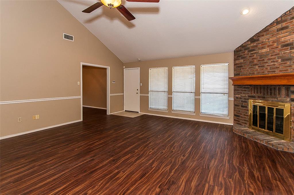 1004 Ledgemont Drive Plano, TX 75025 - Photo 5 of 29 wooden floor in an empty room with a window