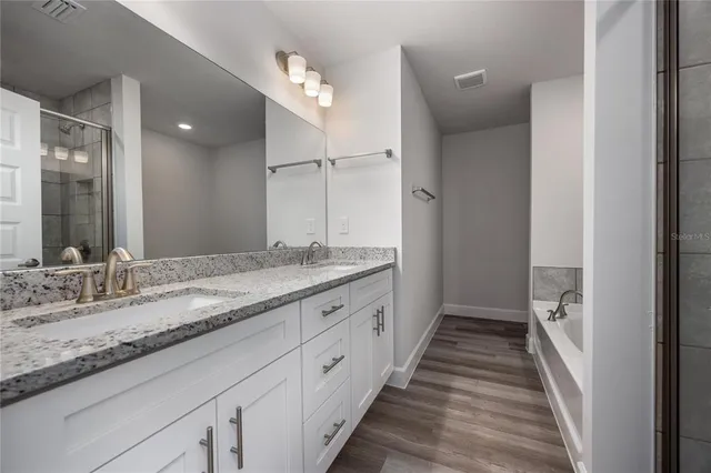 a bathroom with a white bath tub