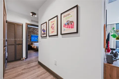 a view of a hallway with workspace