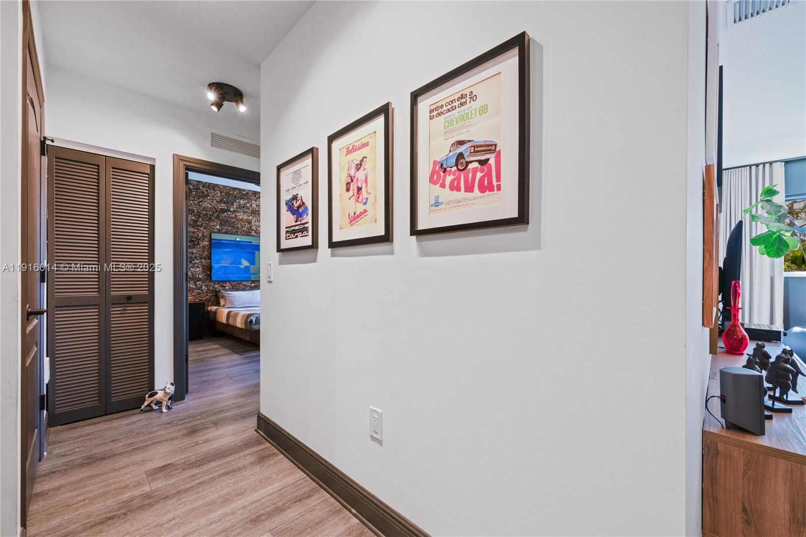 652 Northeast 63rd Street, Unit 403 Miami, FL 33138 - Photo 11 of 28 a view of a hallway with workspace