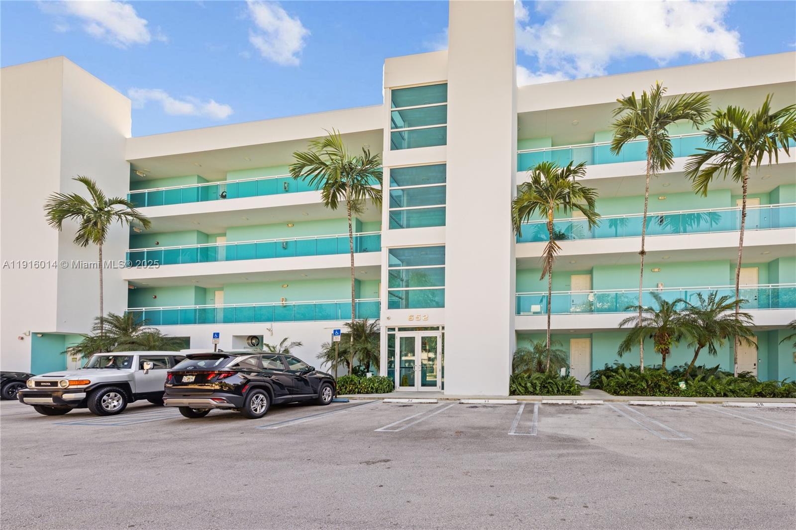 652 Northeast 63rd Street, Unit 403 Miami, FL 33138 - Photo 19 of 28 a car parked in front of a building
