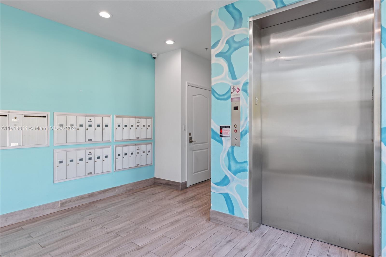 652 Northeast 63rd Street, Unit 403 Miami, FL 33138 - Photo 27 of 28 a view of an entryway with wooden floor